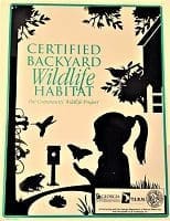 cwp sign A book cover with a girl and bird in front of a tree.