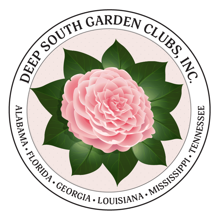 A pink flower with green leaves in the center.