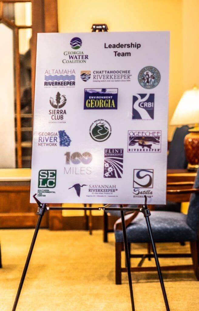 A sign with many logos on it