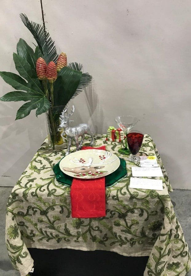 A table set with plates and napkins on it.