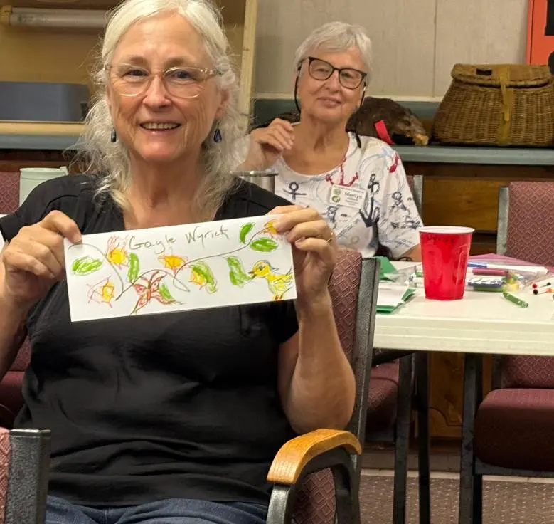 cwp wyrick aldridge magnolia Magnolia District member Gayle Wyrick proved to be quite the artist. Her sister Marilyn Aldrich, Magnolia DD, looks on.