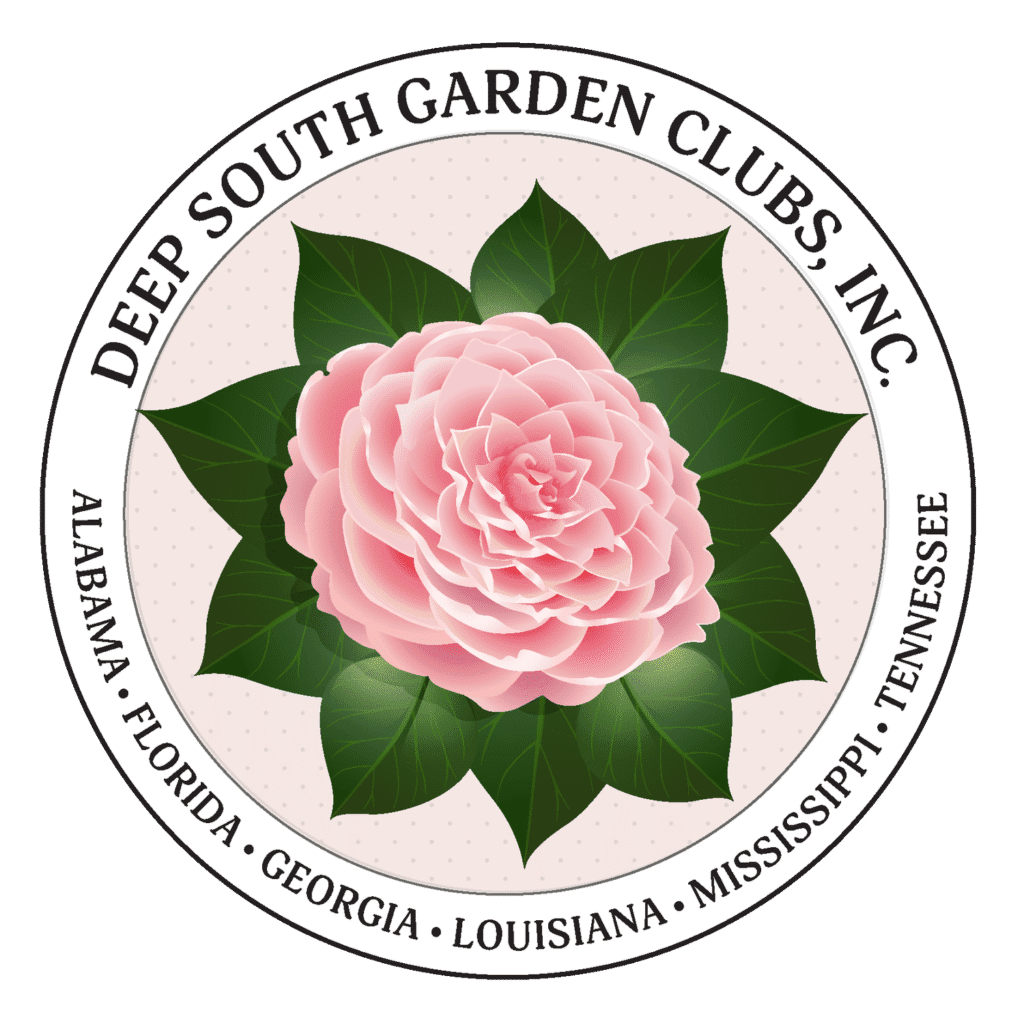 A pink flower with green leaves in the center.