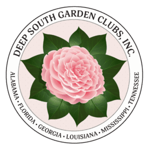 A pink flower with green leaves in the center.