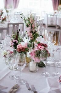 Elegant pink floral centerpiece on wedding table