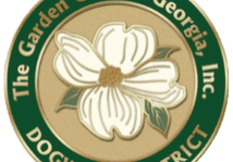 DogwoodLogoWhiteBackground A green and white logo with flowers on it.