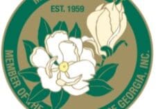A logo of the magnolia district.